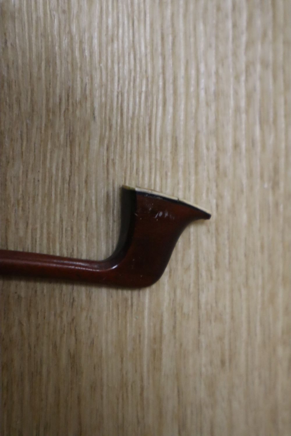 A silver-mounted violin bow, unsigned, 29in.